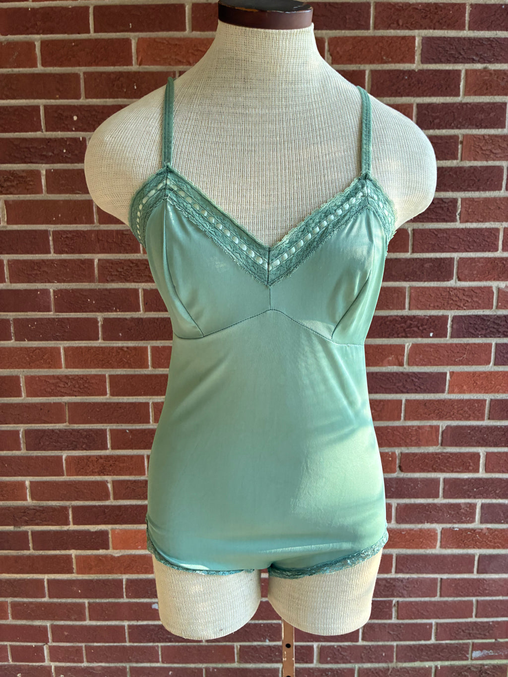 sage green vintage body suit